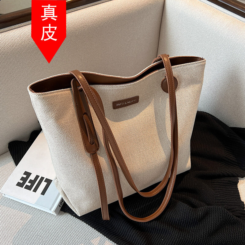 Hong Kong canvas large-capacity bag women's 2022 new niche commuter bag all-match casual one-shoulder tote bag