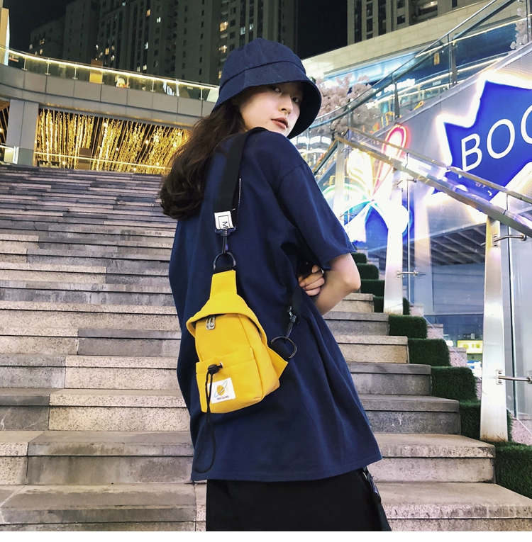 Túi ngực nam 2019 new triều siêu lửa thương hiệu túi nhỏ vải canvas crossbody thể thao cá tính túi đeo vai - Túi của con người