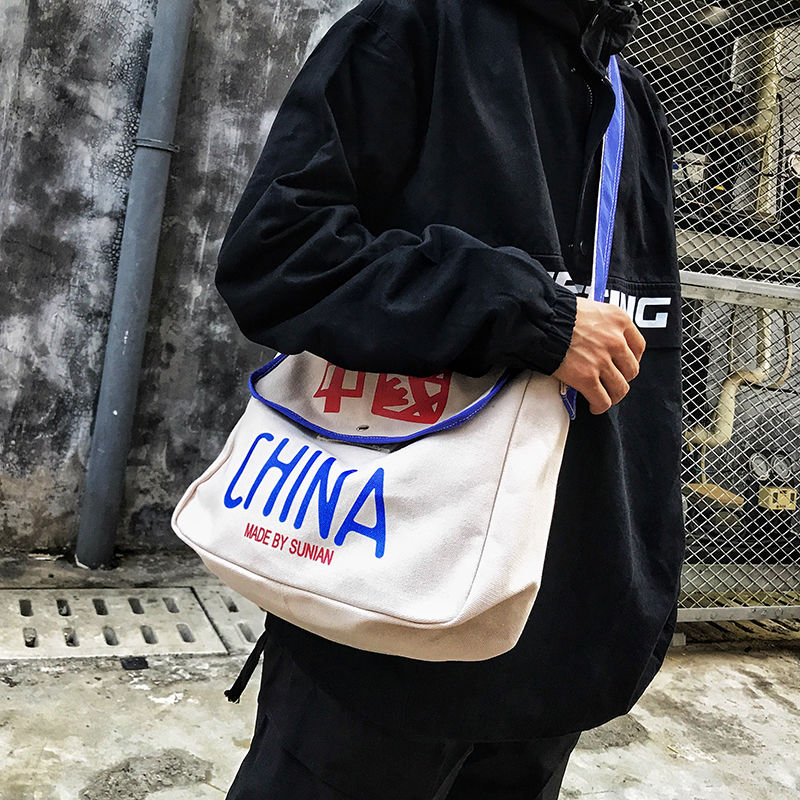 Canvas bag men's shoulder bag one-shoulder messenger for the people service bag ins tide bounce bag boys messenger bag college students