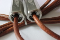 Tailor-made new Ruisibang stainless steel weight-bearing professional fitness practice not winding cowhide skipping rope built-in bearing