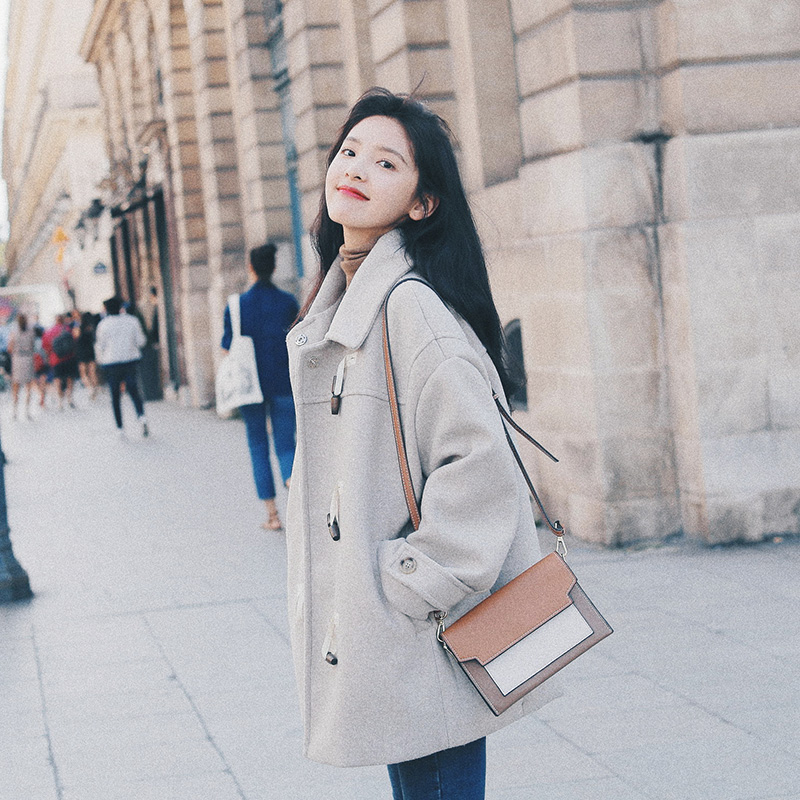 Small sub-thickened wool jacket woman 2021 autumn winter new Korean version of the Korean version of the popular horn buckle in the long version of the sub-coat