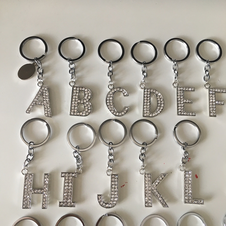 Zinc alloy metal key button 26 English letter hanging creative gifts can customize LOGO cartoon small gifts