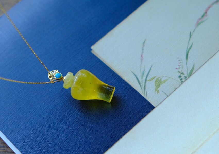 Vase endless 18K gold sleeping beauty blue turquoise buckle raw ore amber handmade three-dimensional classical vase Yajian