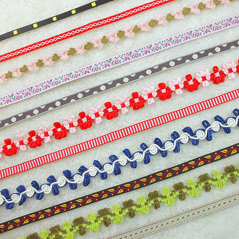 Bai Caihui Ethnic minority characteristics small lace jacquard clothing design DIY handmade doll clothing with webbing experts