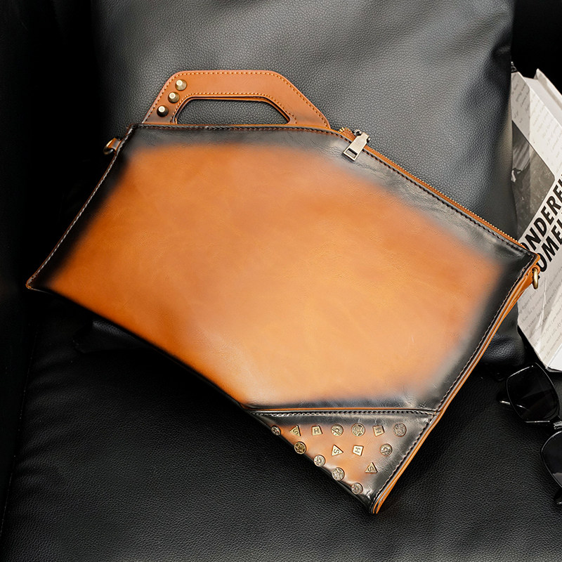 Personality Tide Retro Hand Grip Bag Fashion Rivet Trendy Hand Grab Bag Casual 100 Lap Single Shoulder Bag Inclined Cross Ipad Bag