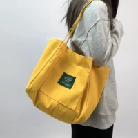 Желтый вместительный и большой шоппер