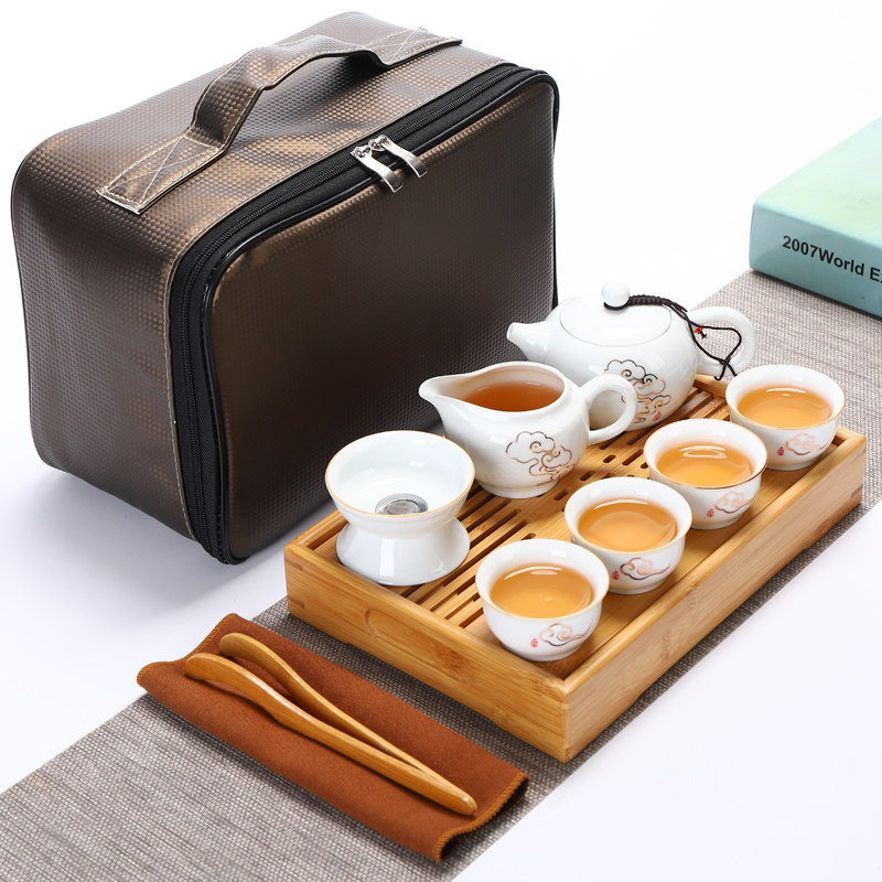 Portable travel kung fu tea set ceramic teapot small set mini outdoor travel bag car bamboo tea tray