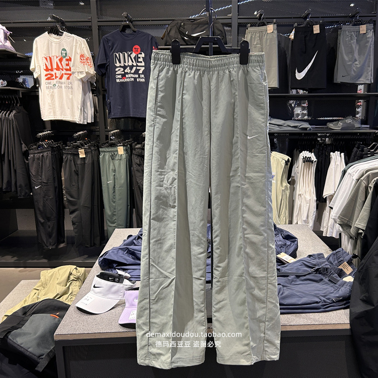 Authentic Nike Women's Sports Pants with Nike Logo, Water-Resistant, Sun-Protective, Woven, Mid-Waist Long Pants Fq3589