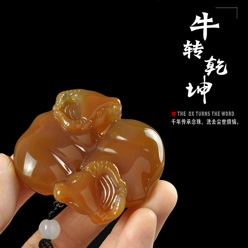 Natural jade agate raw stone sculpted cow turn dry Kun men and women carry out a piece of jade medullary handle piece text with a hand piece
