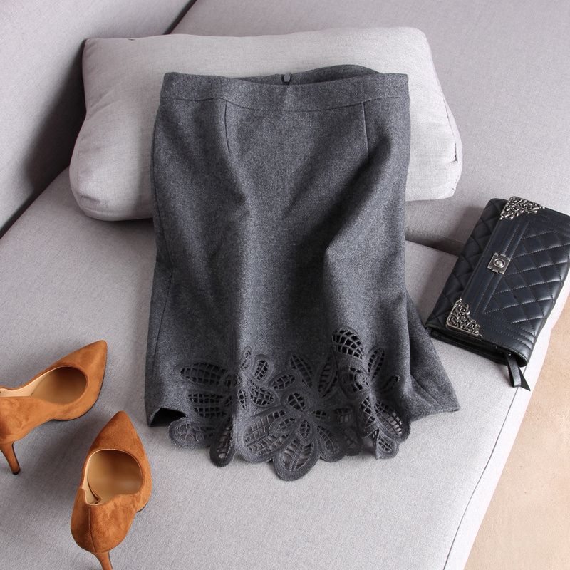 High-end commuter OL Conspicuos ~ Hollowed-out Flowers Wool Half Body Dress Pencil Skirt Child's Korean version of the new