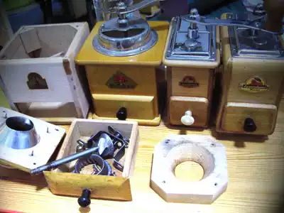 Hand-cranked coffee grinder refurbishment repair cleaning service