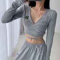 Spicy girl cross tied rope V collar long sleeve T-shirt female European and American Spring and autumn new short section of high waist ruffled and open navel blouse