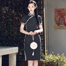 Plaid cheongsam 2021 new young girl spring Chinese style modified French dress slim summer women