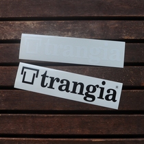 Swedish trangia original factory sticker adhesive style sticker containing box car with desktop computer suitcase outdoors