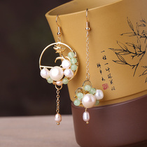 Asymmetric earrings female pearl earrings design sense long tassel personality exaggerated earrings Net red ear clip face thin