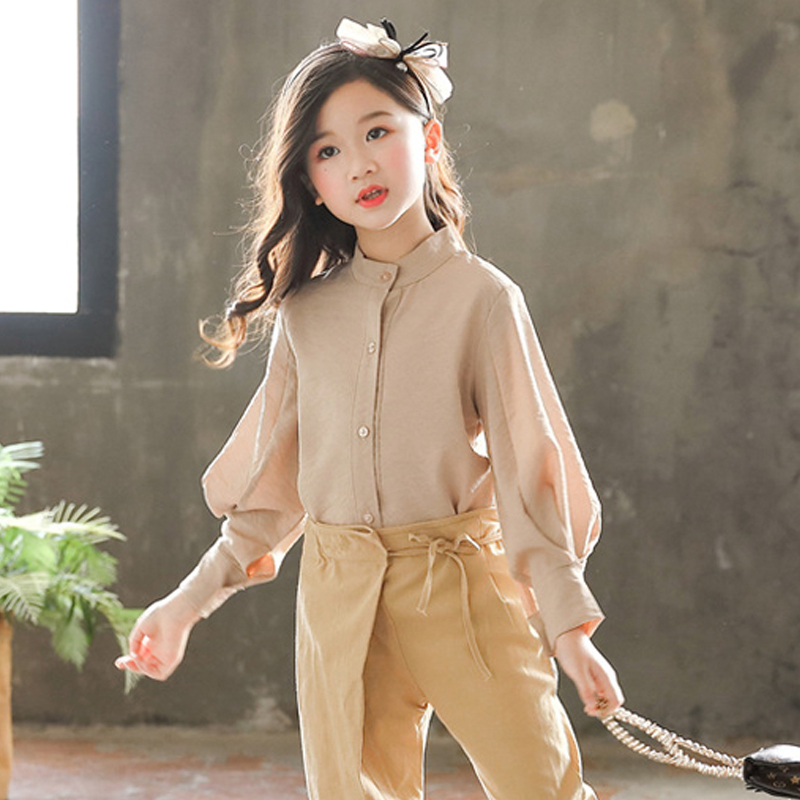 Girls áo dài tay áo 2020 mới mùa xuân và mùa thu Hàn Quốc phiên bản của bông cotton vừa trẻ lớn không khí giống như thủy triều áo sơ mi trắng của trẻ em.