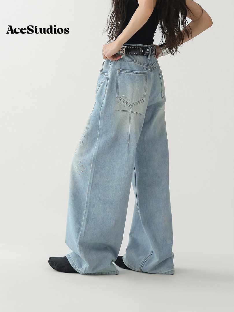 Model wearing light-wash wide-leg denim jeans