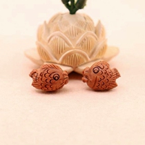 New hand-carved peach core carving original core carving peach blessing and peace small jewelry pendant dragon pattern kissing fish