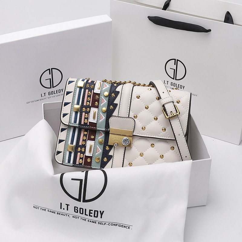 Hong Kong ITGDLEDY female bag leather chain bag 2023 new tide riveting net red slug bag girl