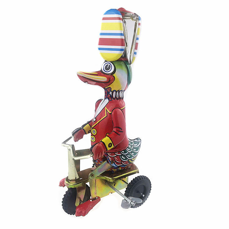 Tin toy duck rides iron toy duck ride three wheels