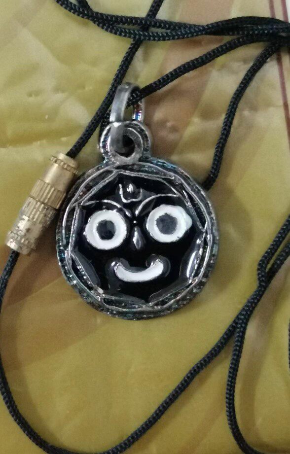Jagannatha, the head of the universe, Joy Head of the Gaganatus, like an alloy silver-plated pendant
