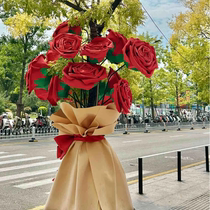 Outdoor giant rose bouquet window display large floral decoration ornaments blooming on the tree shopping mall door decoration