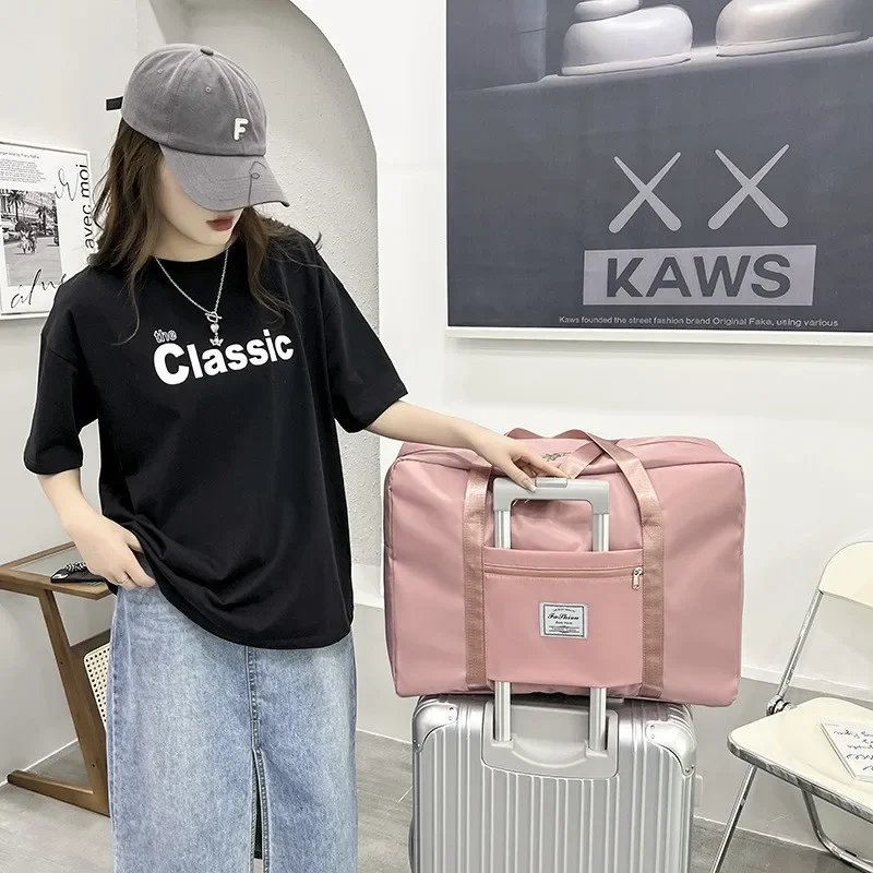 Double-layer thickened moving travel clothes quilt storage bag wholesale luggage bag portable trolley case aircraft bag