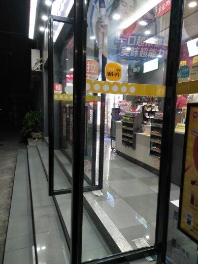 Dongguan stainless steel frame tempered glass floor pop-up door glass sliding door office shop hotel entrance door