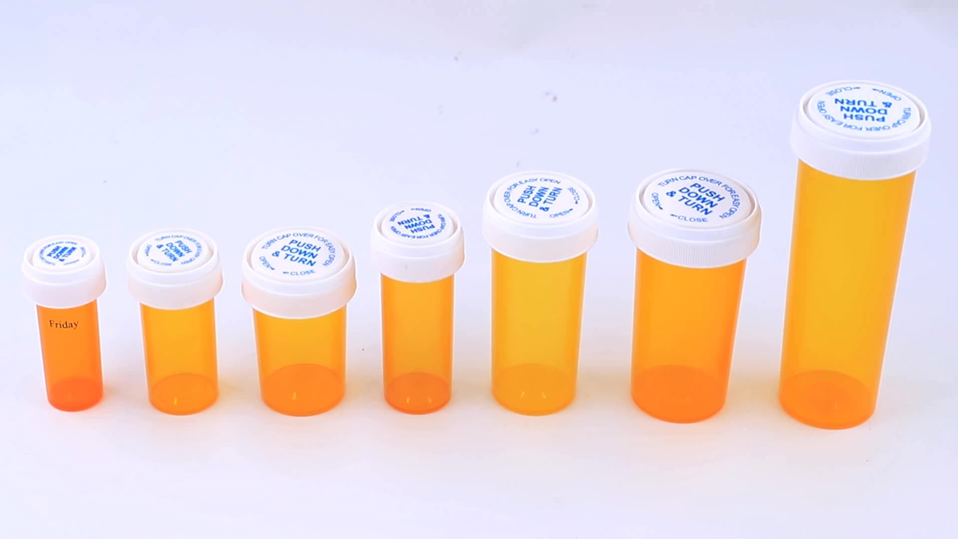 Plastic Reversible Vials Or Pill Bottles Or Dram Vials With A Child