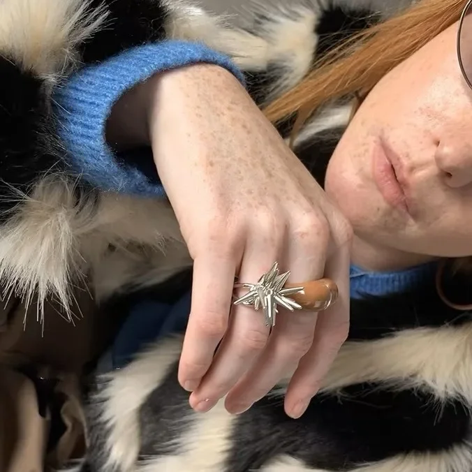 Brand retro ring with tassels