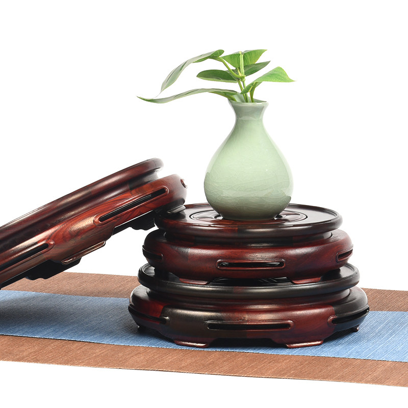 Wooden carving frame of wooden carved wooden redwood round base of statue statue