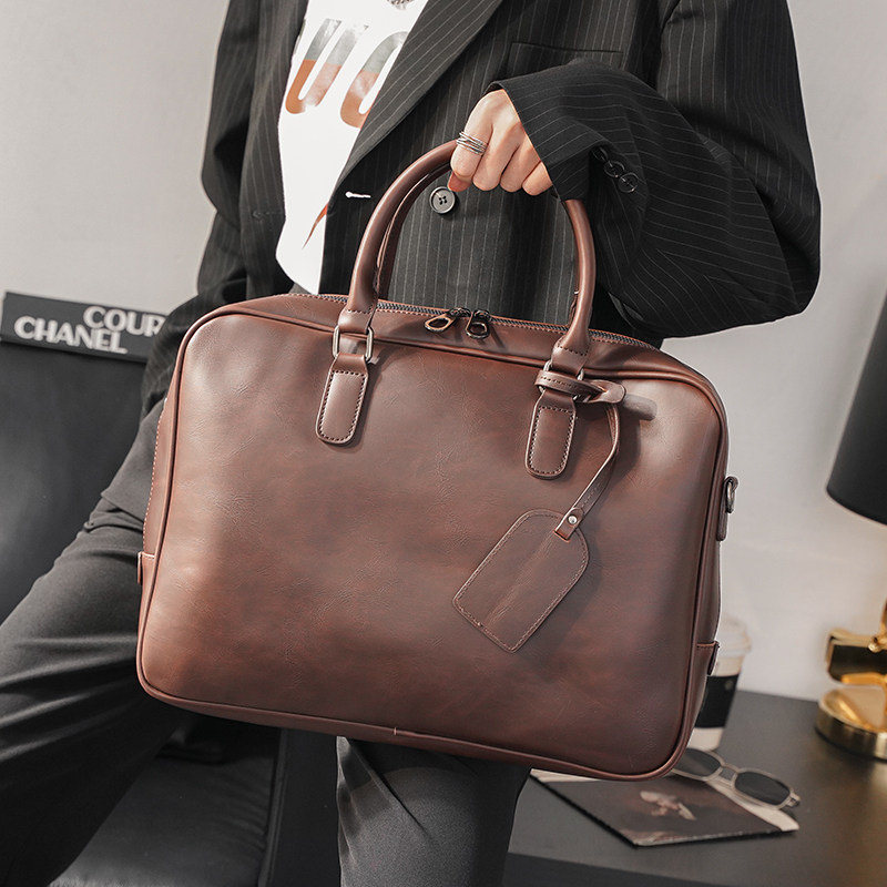 Trendy new retro public briefcase Korean version of men and women Fashion stereotyped business men's bag single shoulder inclined satchel wave men's bag