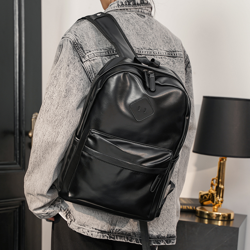 Trendy new men's backpack casual leather street backpack student schoolbag computer bag Korean version of the trend men's bag