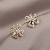 Hong Kong (designer) RVY 2021 new earrings female hollow Clover simple cold wind earrings