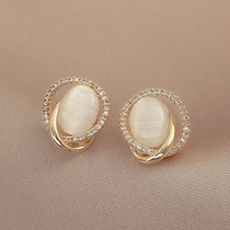 Hong Kong (designer) RVY 2021 New Tide cats eye stone earrings female temperament earrings advanced earrings