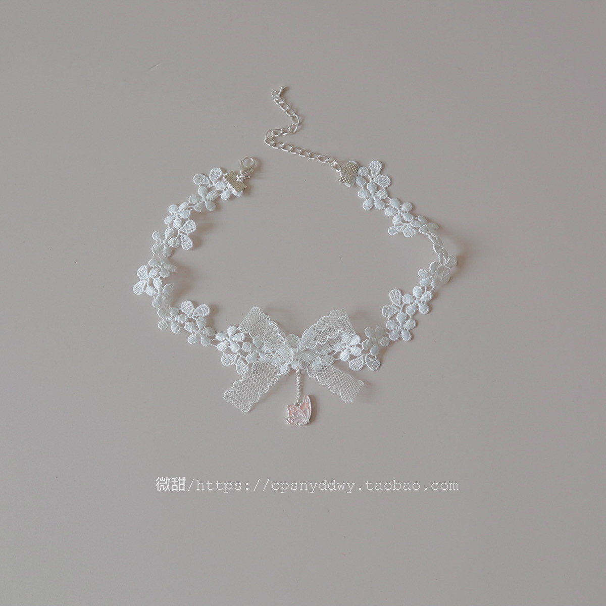 A super cute white lace choker with floral and butterfly design, perfect for a sweet and girly look. Also available: a new style neckband/collarbone chain necklace.