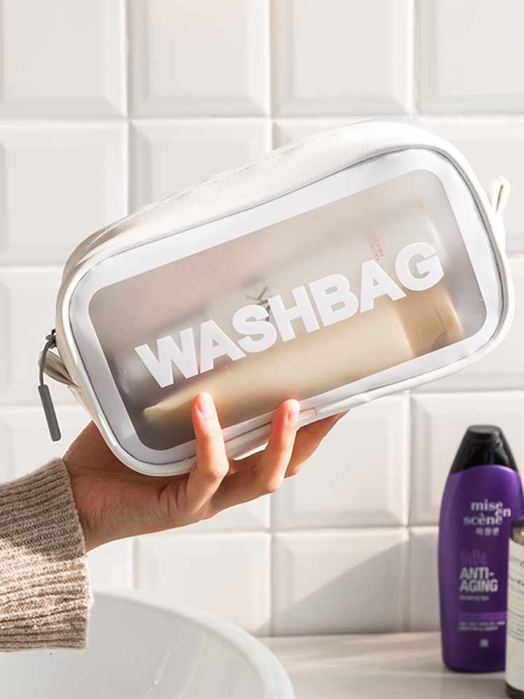 Cosmetic bag small portable girl heart transparent portable net red ins wind super fire large capacity cosmetics storage bag