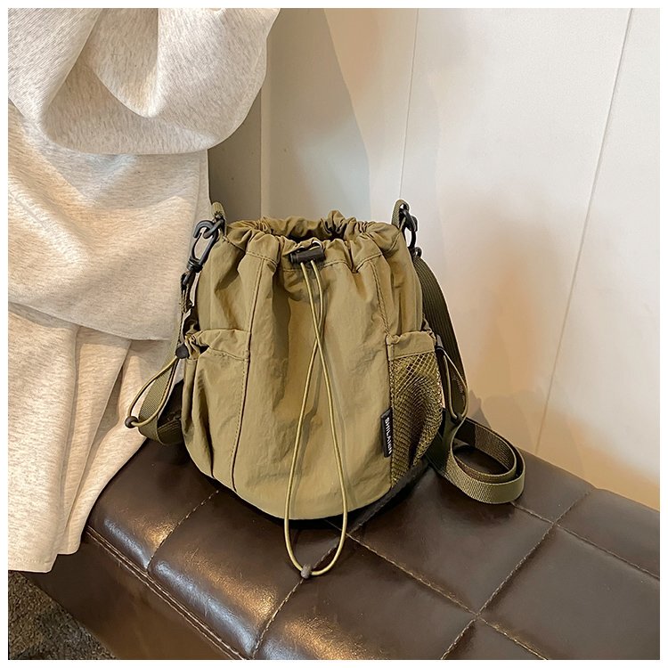 Casual and Lightweight Canvas Mobile Phone Bag for Women 2025 New Style Casual and Versatile Travel Outdoor Waterproof Cross-Body Small Bucket Bag
