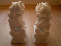 A pair of white marble lions a pair of cemetery gatekeepers household ornaments stone carvings funeral supplies and burial guardian stone lions