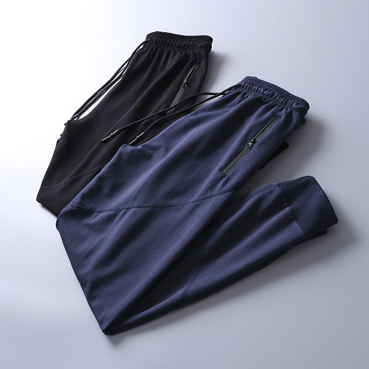 Technology quick-drying fabrics Foreign trade men's clothing factory cut label tail goods sports slim small foot sweatpants closing casual pants