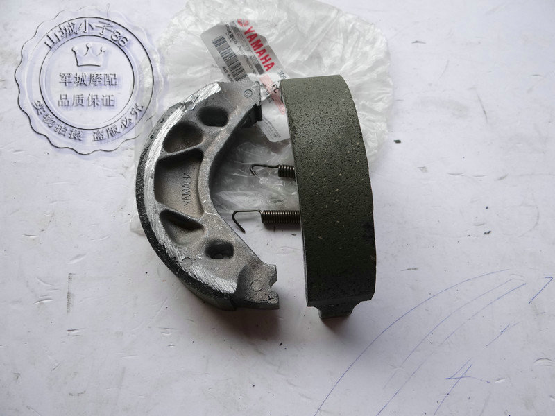 Tianjian 125 gốc phía sau phanh khối YBR125 E S đĩa phanh phía sau Tianjian Wang Tianjun 125 khối phanh thắng xe máy