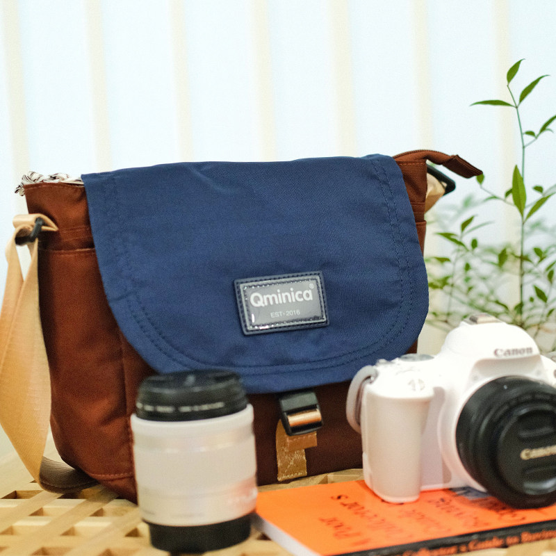 Qminica2022 new stylish skew cross-pack light 100 hitch large capacity flip camera casual carry-on bag