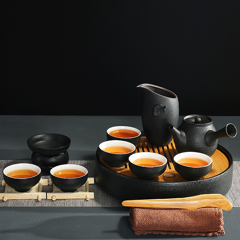 Variable tasted silver gilding kung fu tea set Japanese travel tea set of black suit portable contracted household ceramic teapot tea tray