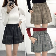 Mùa thu đông mới eo cao là quần short len ​​kẻ sọc mỏng nữ quần ống rộng mùa đông dày len hoang dã quần bốt mặc