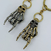 Dongguan broken copper pure copper two-color skeleton ghost hand car keychain pendant creative copper ghost head pendant skull