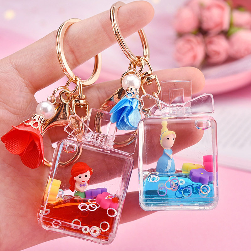 Acrylic creative small flower mermaid liquid quicksand bow perfume bottle car key chain baby bag pendant