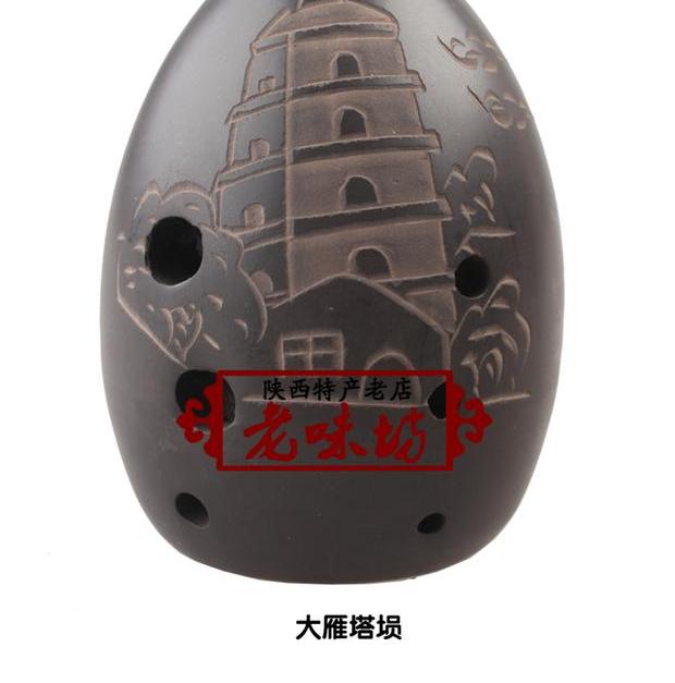 Nhạc cụ cổ xưa của Trung Quốc Đồ gốm đen engraving Hình mẫu âm thanh nổi hình gấu trúc - Nhạc cụ dân tộc đàn đáy