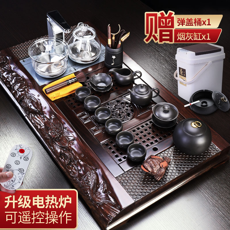 Tang big wooden embossment household ebony ground tea ceramic kung fu tea set office remote control electric heating furnace