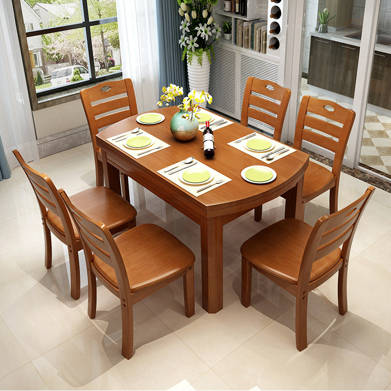 All solid wood modern Chinese dining table foldable telescopic rubber wood dining table and chair combination round dining table small apartment