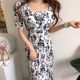 Korean chic French retro ink printing square collar leaking collarbone tie waist slimming pleated dress long skirt